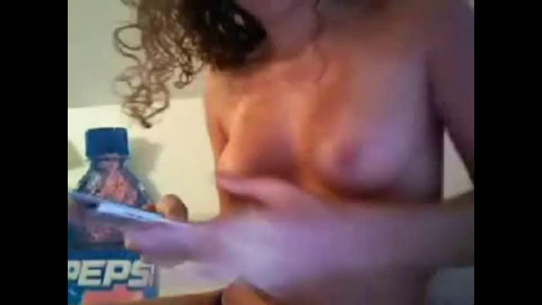 Curly haired amateur girl stripping and masturbating